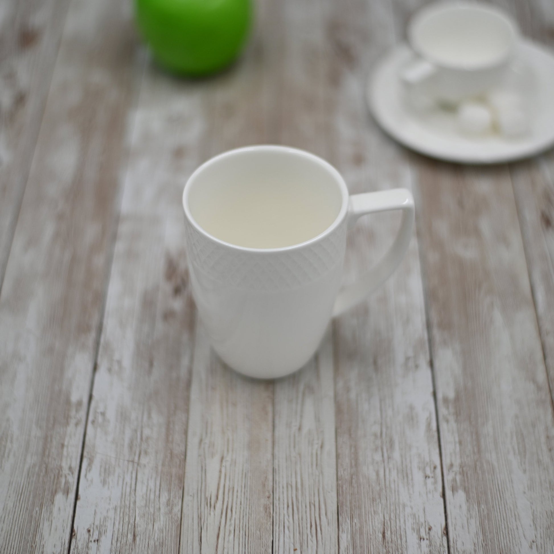 https://www.leavesofleisure.com/cdn/shop/products/white-coffee-mug-12-oz-350-ml-by-wilmax-porcelain-960939.jpg?v=1684892337&width=1946